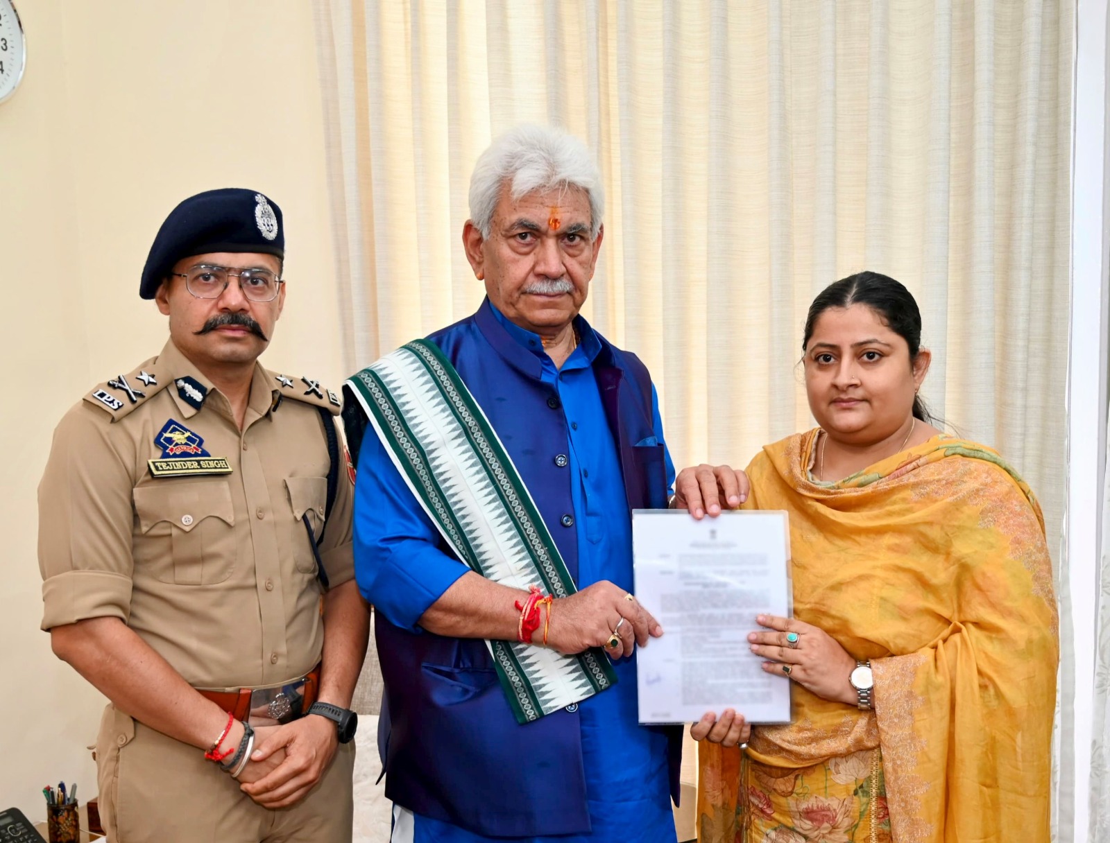 'Lt Governor hands over appointment letter to deceased PSI Sachin Verma’s wife'